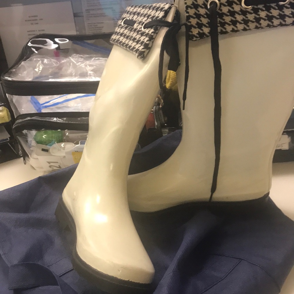 Black and white rain boots